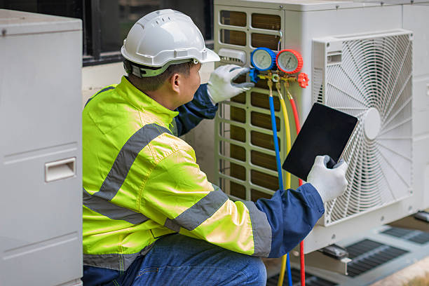 Professional Hvac technician working in Louisville, OH